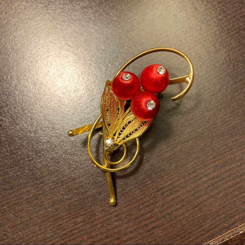 Goldtone mixed media brooch pin with red berry motif and rhinestone